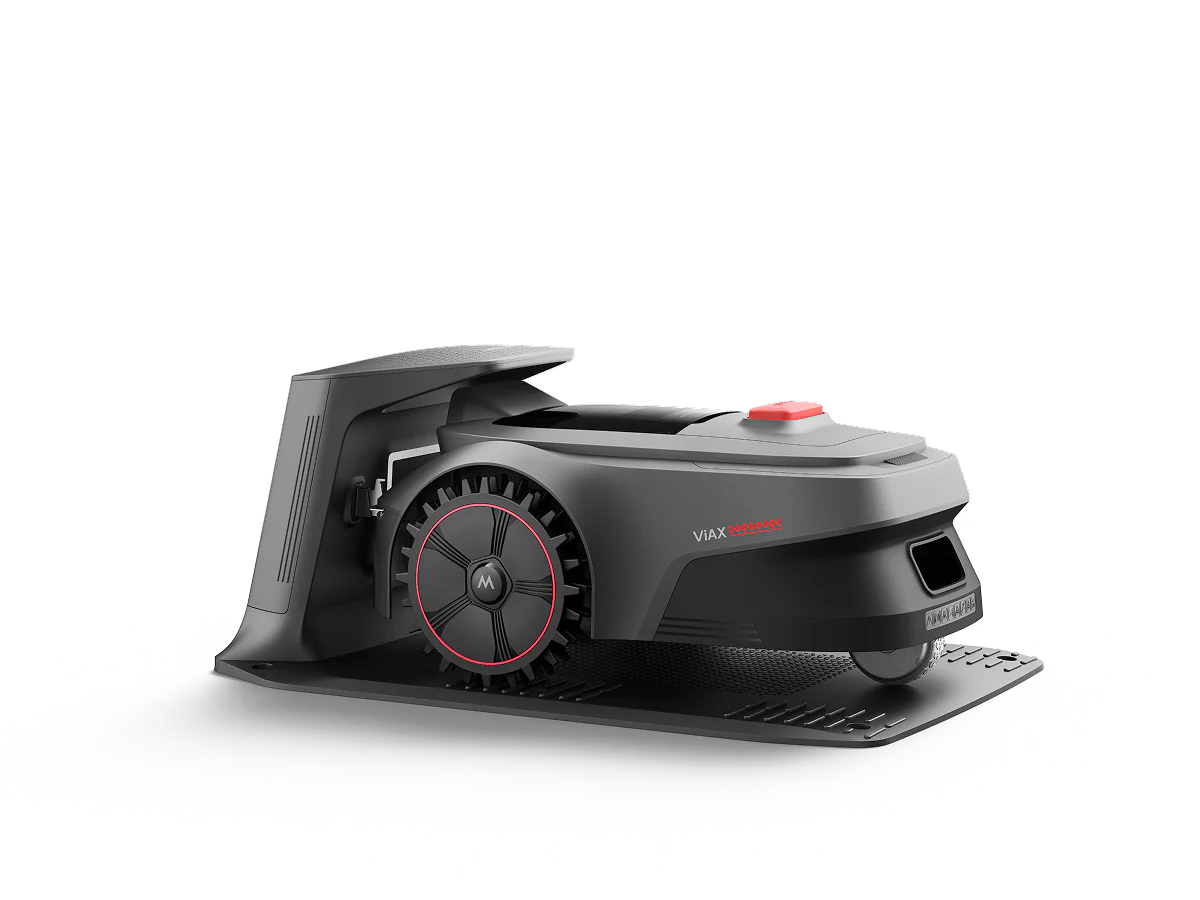MOVA ViAX 300 robot lawn mower reversed onto its flat charging base station on a white background